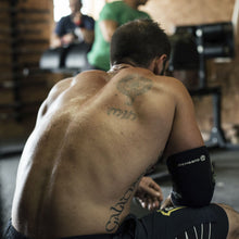 Load image into Gallery viewer, Rehband RX Elbow Sleeve - 5mm - Camo - SINGLE